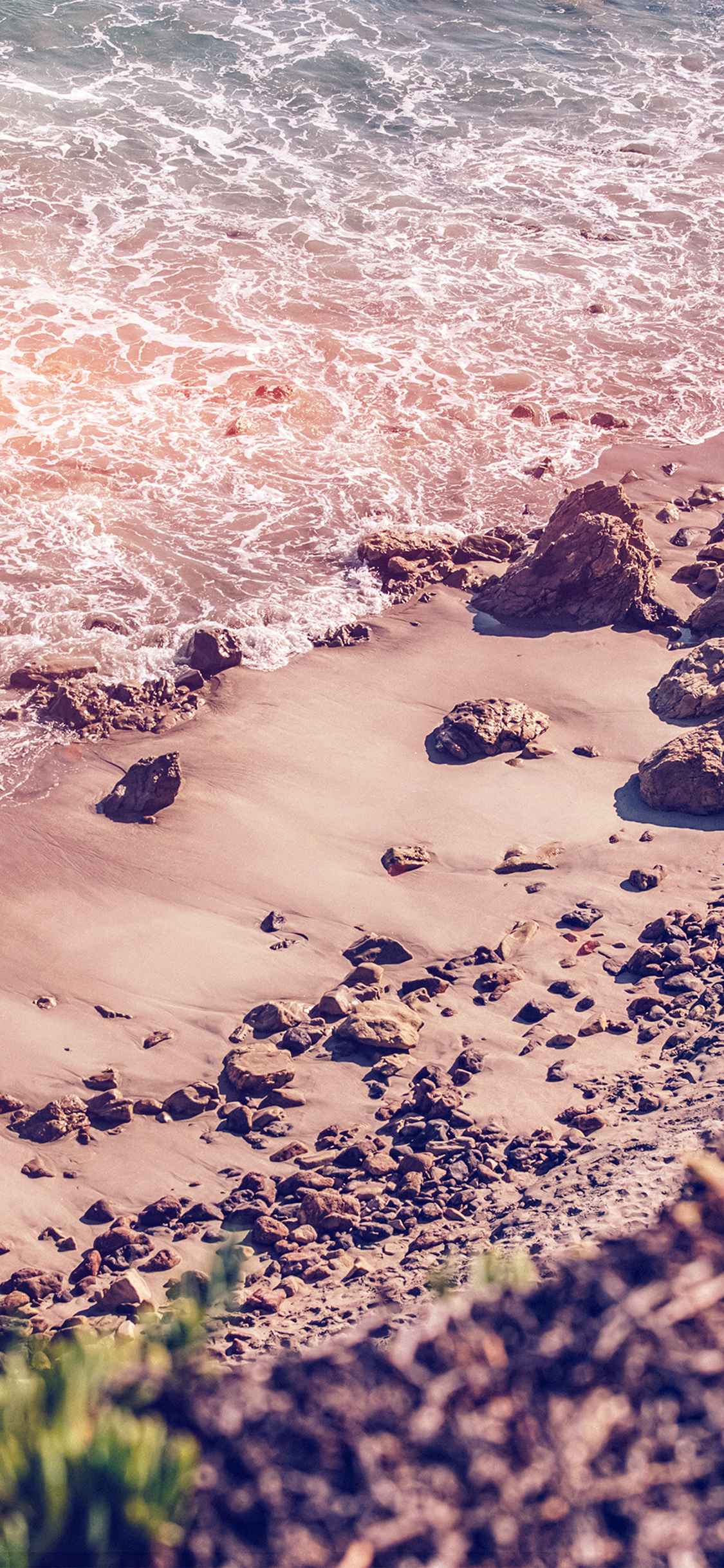 沙滩上的碎石子唯美摄影手机壁纸